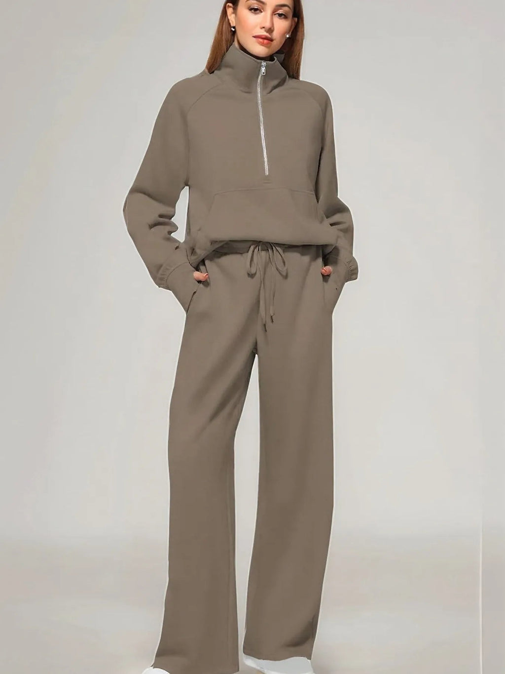 Conjunto de pantalón y top de manga larga con media cremallera