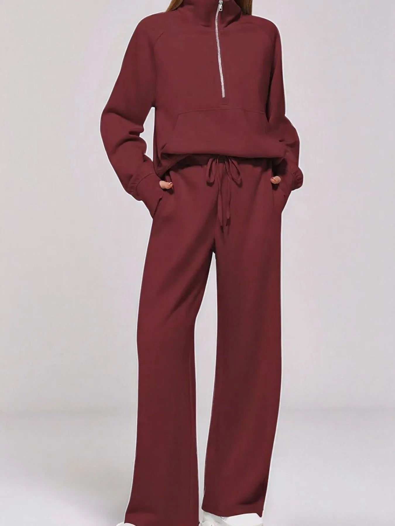 Conjunto de pantalón y top de manga larga con media cremallera