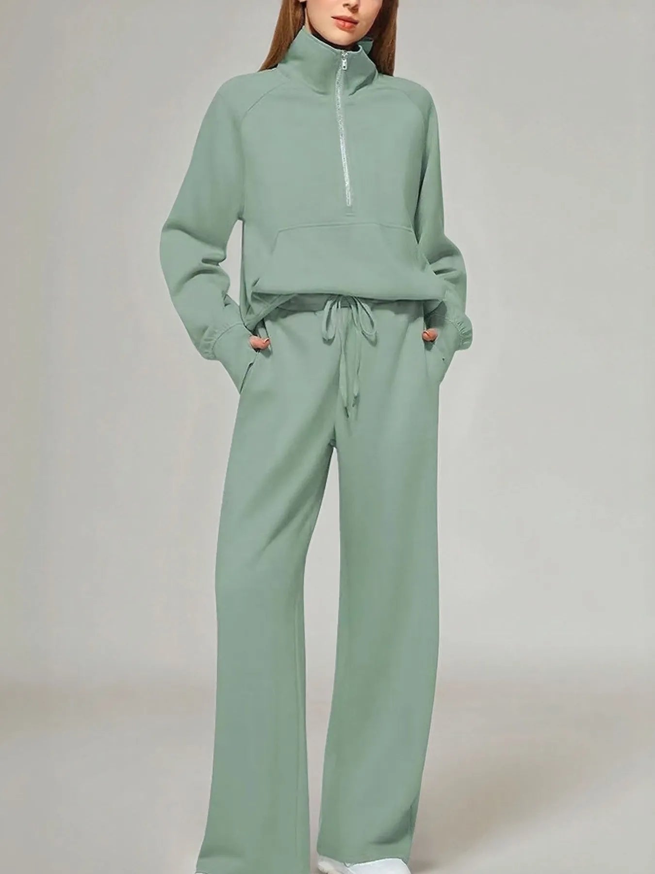 Conjunto de pantalón y top de manga larga con media cremallera