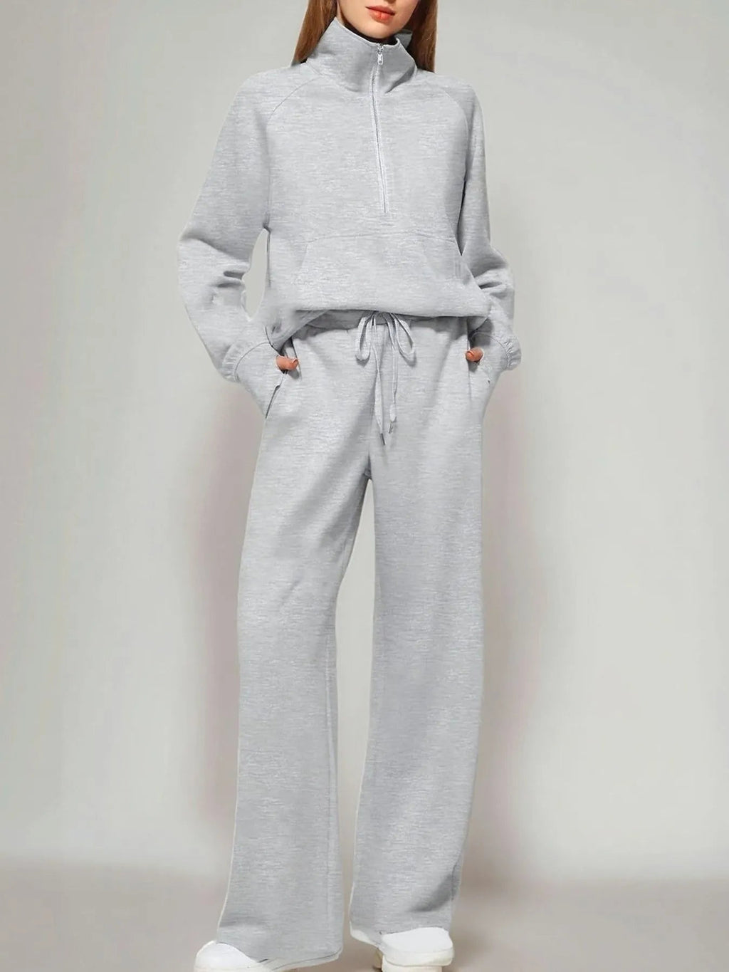 Conjunto de pantalón y top de manga larga con media cremallera
