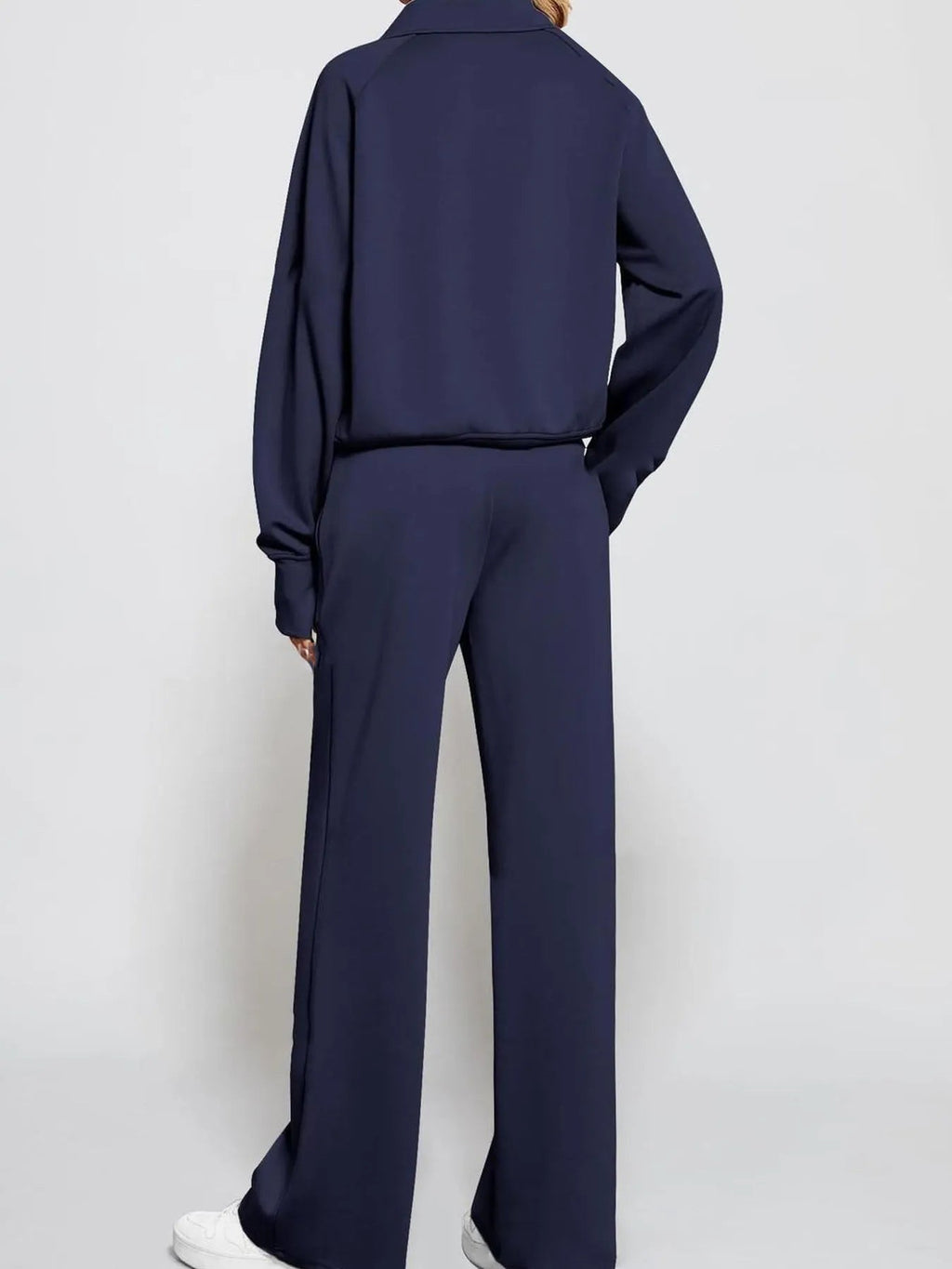 Conjunto de pantalón y top de manga larga con media cremallera