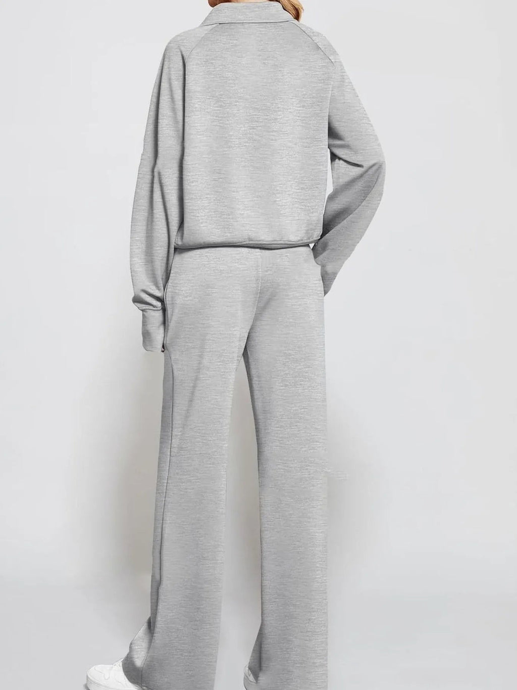 Conjunto de pantalón y top de manga larga con media cremallera